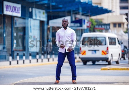 Creative emotional Portraits of young mid-adult Kenyan black Male Man In Nairobi City County Fashion Streets Style Photography Kenyas Capital City East Africa. Fashion Male Lifestyle Photographers Sty