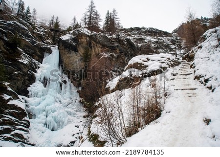 The Lillaz waterfalls in Cogne Aosta valley during the winter season Royalty-Free Stock Photo #2189784135