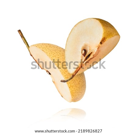 Fresh yellow ripe raw pear falling in the air isolated on white background. Food zero gravity conception. High resolution image.