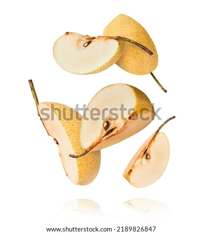 Fresh yellow ripe raw pear falling in the air isolated on white background. Food zero gravity conception. High resolution image. Royalty-Free Stock Photo #2189826847