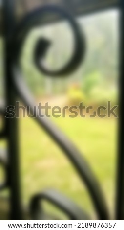 metal windows see through, the exterior of a house garden area, and blurred background concept.