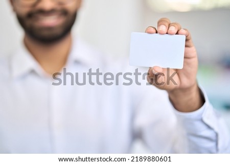 Business man holding namecard mock up template showing print paper business visit card white blank empty businesscard mockup. Introduction and presentation concept. Close up view