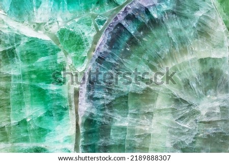 Green Fluorite precious stone. Fantastic semiprecious Italian green stone with purple, violate veins. Matt pattern for digital wall tiles and floor tiles as part of classic home interior. Royalty-Free Stock Photo #2189888307