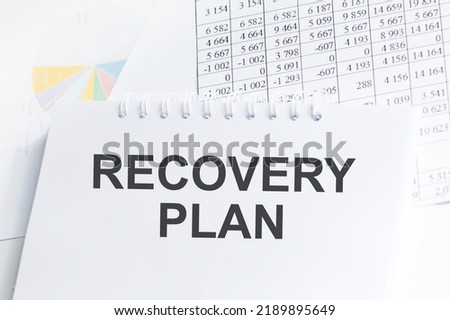 Recovery Plan inscription on a notebook on an office desk, a business concept