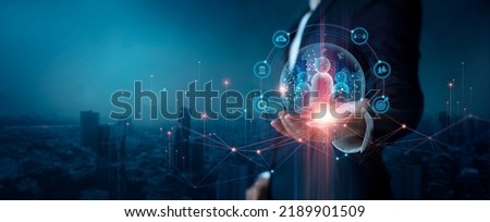 CRM. Customer network relationship management concept, Businessman hold of global structure customer network technology, Data exchanges development. customer service, Banking, Business strategy. Royalty-Free Stock Photo #2189901509