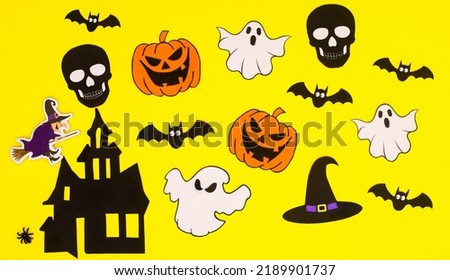 Halloween pattern with creepy stickers on yellow background. Flat lay. Autumn holidays concept