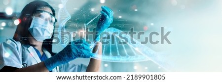 Scientists are experimenting and research with molecule model, DNA, Human Biology, Genetic research, Science with molecules and atoms in the laboratory, Medical science and biotechnology. Royalty-Free Stock Photo #2189901805