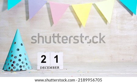 Birthday December 21 on the calendar. Happy birthday card with date copy space. Holiday decorations for congratulations, place for text
