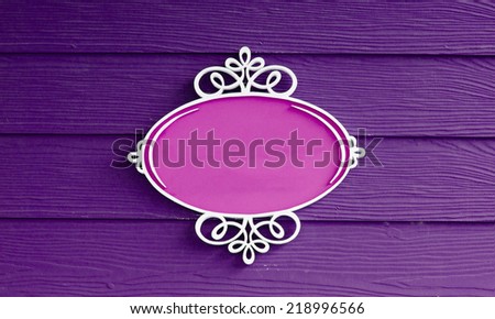 Blank sign board on wood background