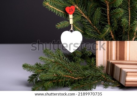 New 2023 year and holidays are coming. Preparation for a merry Christmas and happy new year. Time to plan future presents, booking, shopping, vacation. Lovely white and red hearts. Copy space, mock up