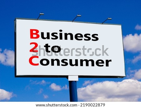 B2C business to consumer symbol. Concept words B2C business to consumer on white billboard against blue sky and clouds. Beautiful background. Business and B2C business to consumer concept. Copy space.