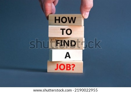 How to find a job symbol. Concept words How to find a job on wooden blocks on a beautiful grey table grey background. Businessman hand. Business and how to find a job concept. Copy space. Royalty-Free Stock Photo #2190022955