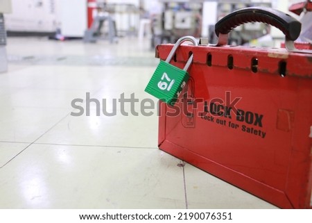 Lock box and switch gear room background ,Lockout Tagout , Electrical safety system.Key lock switch or circuit breaker for safety protect.in electric room Royalty-Free Stock Photo #2190076351
