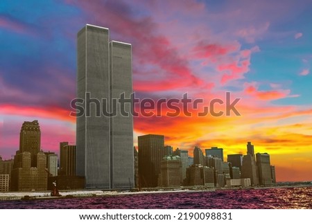 landmark of the Twin Towers at colorful sunset sky. Archival and historical cityscape of New York skyline from New Jersey. Lower Manhattan in NYC, United States.