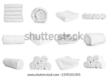 Set of clean soft towels isolated on white Royalty-Free Stock Photo #2190101305