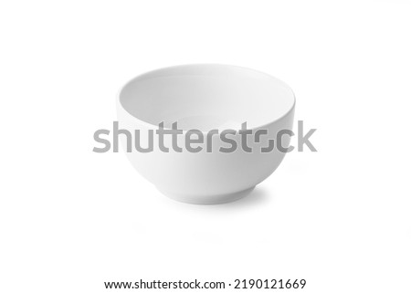 Single white bowl on a white background Royalty-Free Stock Photo #2190121669
