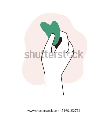 Gua sha jade scraper. Hand holding guasha massage beauty tool for face, neck scraping, skin care. Facial stone quartz massager. Lineart flat vector illustration isolated on white background Royalty-Free Stock Photo #2190152731