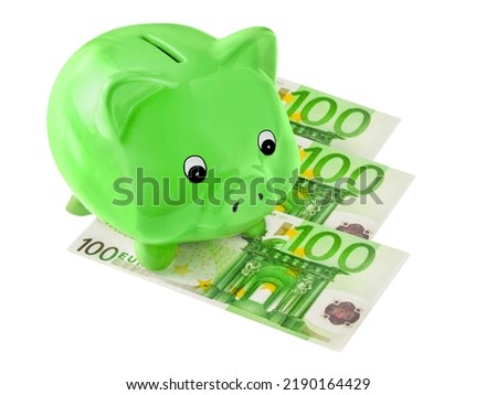Green Piggy Bank and 300 Euro isolated on white background Royalty-Free Stock Photo #2190164429