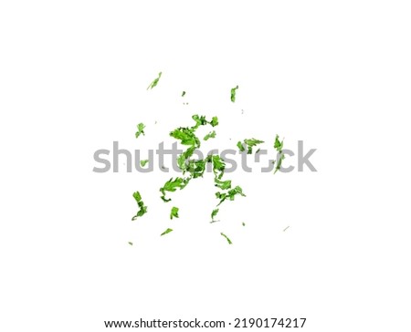 Dry scattered parsley isolated. Crushed cilantro leaves, dried garden parsley, chervil flakes, corriender pileces on white background top view Royalty-Free Stock Photo #2190174217