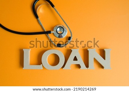 Centered photo on an orange background with a stethoscope on the top right of the loan letters