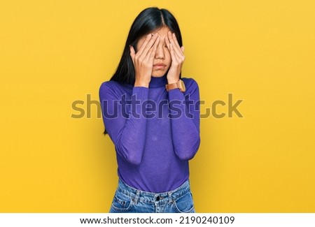 Beautiful young asian woman wearing casual clothes rubbing eyes for fatigue and headache, sleepy and tired expression. vision problem 