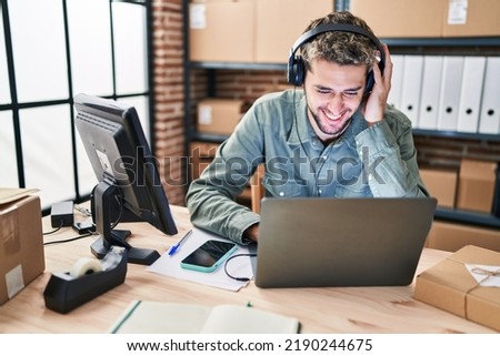 Young man ecommerce business worker having video call at office
