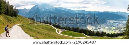 Jenner Mountain. Web banner of the mountains. A Man is Hiking in the alps. Mountain panorama - Berchtesgaden Alps, Germany, Bavaria, Schoenau am Koenigssee Royalty-Free Stock Photo #2190245487