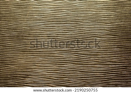 golden panel with some fine grain in it. Royalty-Free Stock Photo #2190250755