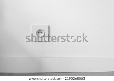 socket on white wall with copyspace, electrical planning, convenient, euro sockets. Power sockets, closeup. Electrical supply Royalty-Free Stock Photo #2190268553