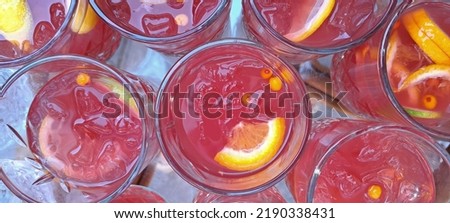 glasses with pink drink and lemon, top view