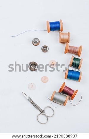 Sewing supplies and accessories for needlework. Craft hobby background.