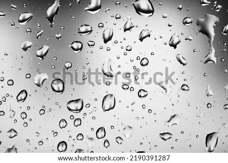 Water drops on a window pane, glass pane, window, rain, bad weather, full-frame, background image
