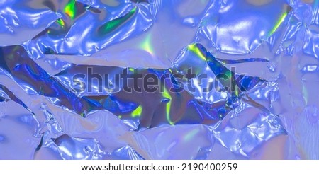 Holographic plastic wrinkled film with contrast light reflections