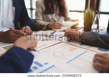 Group of Businessman and Accountant checking data document for investigation of corruption account. Anti Bribery concept. Royalty-Free Stock Photo #2190408373