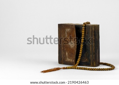 Quran and Tasbih or Sibha (Islamic prayer beads). Royalty-Free Stock Photo #2190426463
