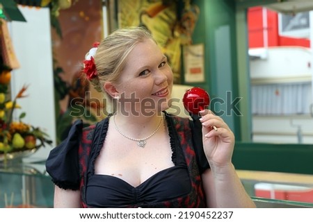 Woman with traditional german costume at a (german) fair (model released)