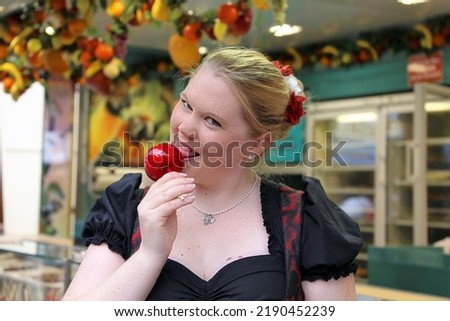 Woman with traditional german costume at a (german) fair (model released)