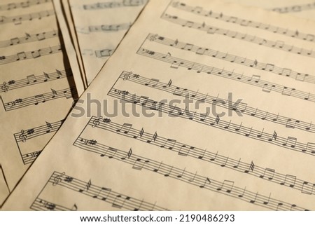 Many old note sheets as background, closeup Royalty-Free Stock Photo #2190486293