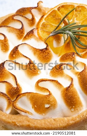 Lemon meringue on vintage background