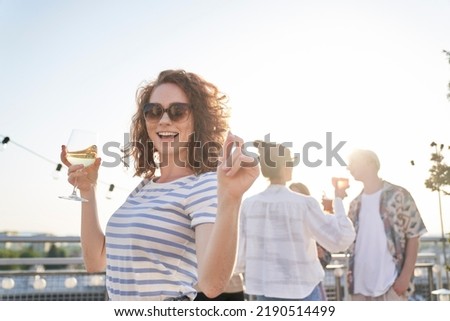 Caucasian ginger women dancing at the rooftop in summer day