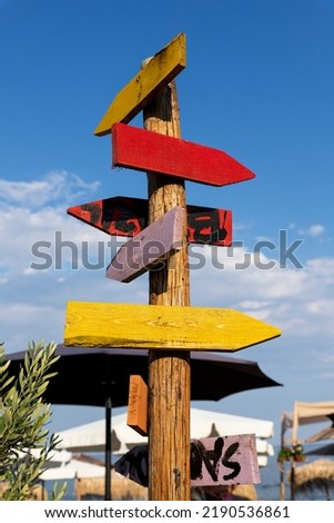 Wooden arrow sign post. Empty boards for your text. Copy space