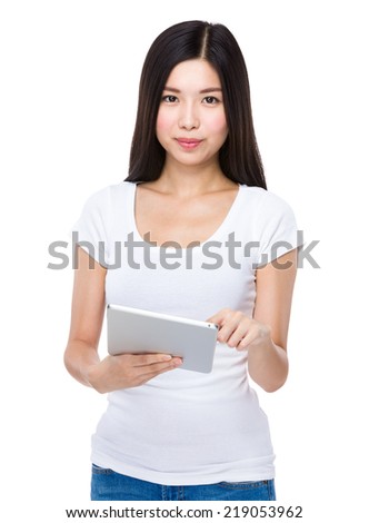 Asian woman read the message on tablet