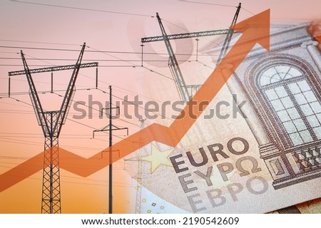 Power lines next to euro notes with rising up arrow. Energy crisis in Europe. Price increase of electricity for home heating and industry. Royalty-Free Stock Photo #2190542609