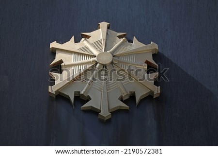 This is a Kanto type fire emblem.
The design of the fire emblem is based on snowflakes, with the sun at the center and water pipes and water columns. Royalty-Free Stock Photo #2190572381