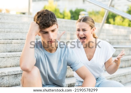 Teenager girl shouting boyfriend. Toxic relationship concept. Royalty-Free Stock Photo #2190578299