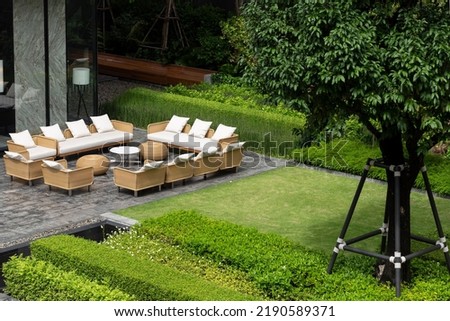 Modern Sofa and furniture on garden.