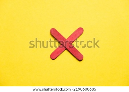 red cross on yellow background free space