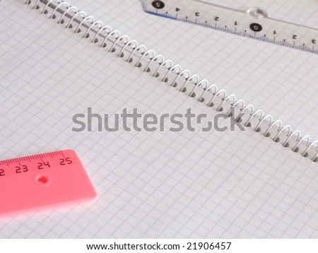 ruler on squared sheet of a copybook