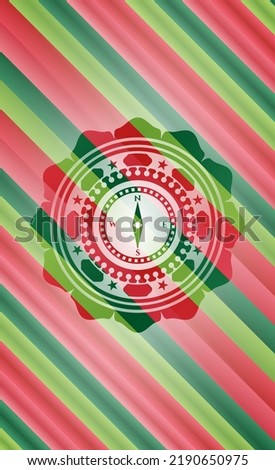 compass icon inside christmas colors style emblem. 