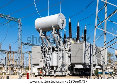 High voltage substation. Power transformer. Electrical distribution substation Royalty-Free Stock Photo #2190660737